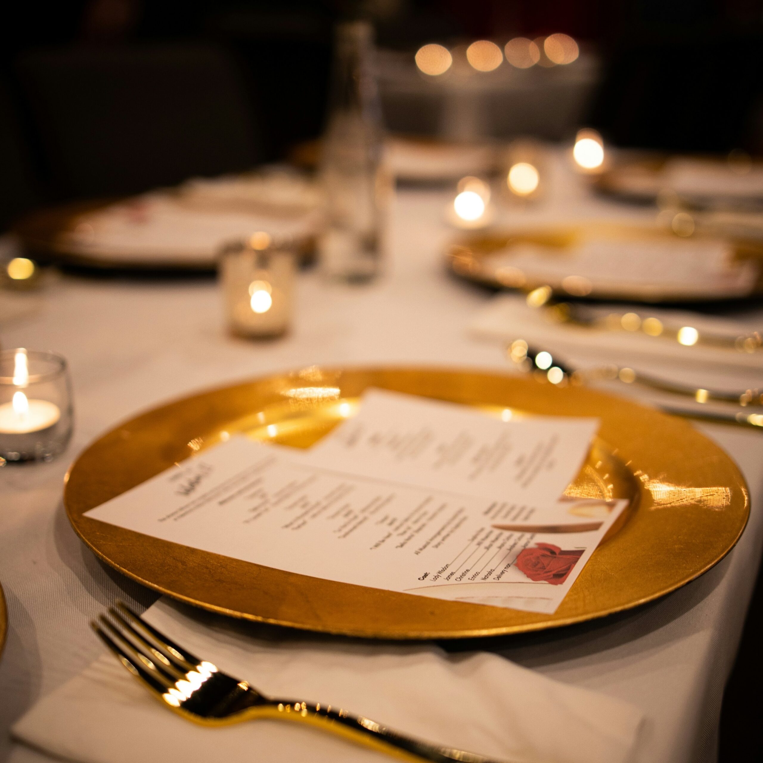 Event Graphic of tree with fall leaves and hanging lights, "Rooted in Faith, Growing in Purpose"